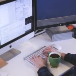 Typing, computer, man — Explore Unique Volunteer Programs Abroad That Offer More Than Just Travel